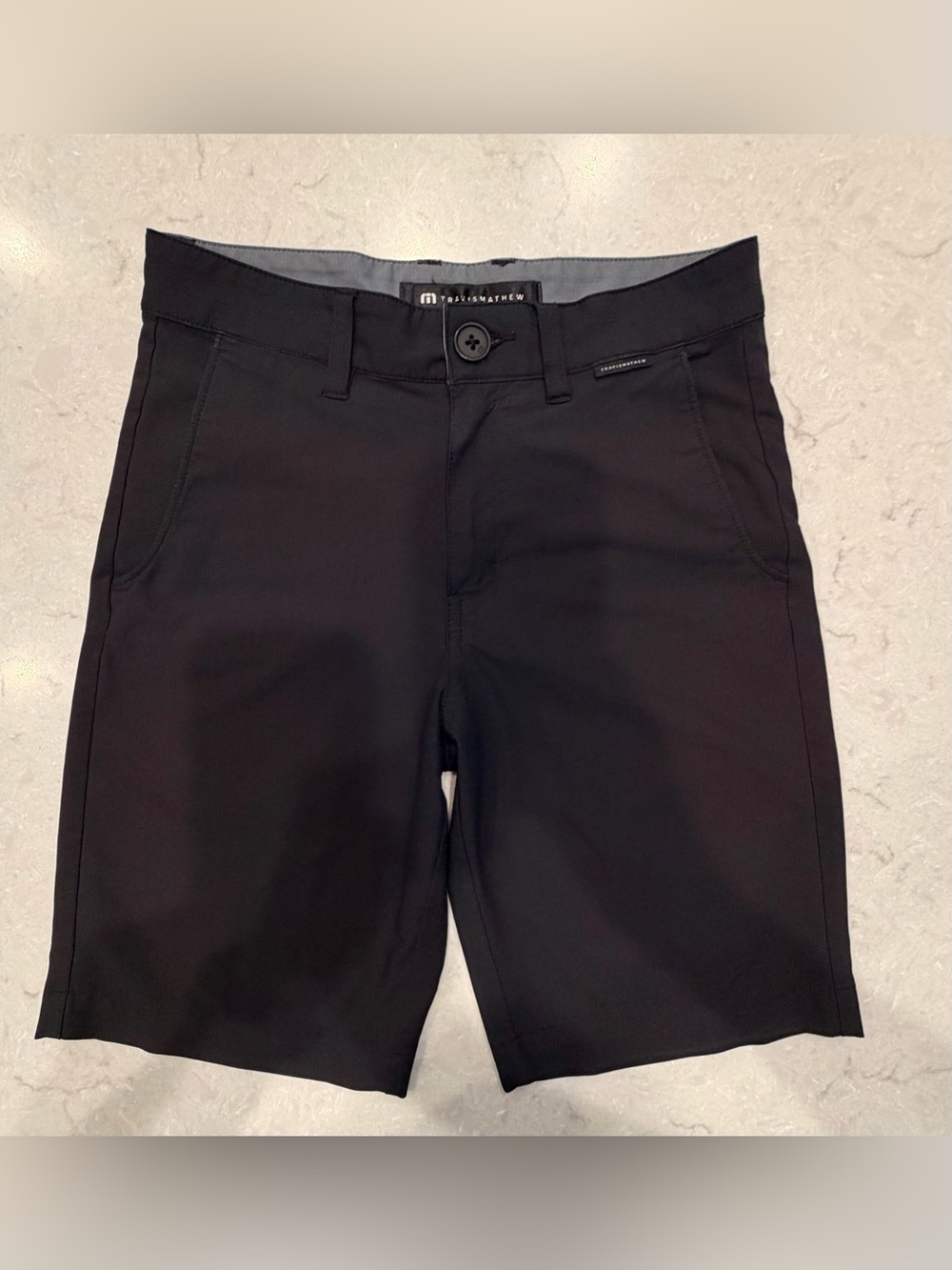 Travis Mathew Black Wanderlust junior golf shorts